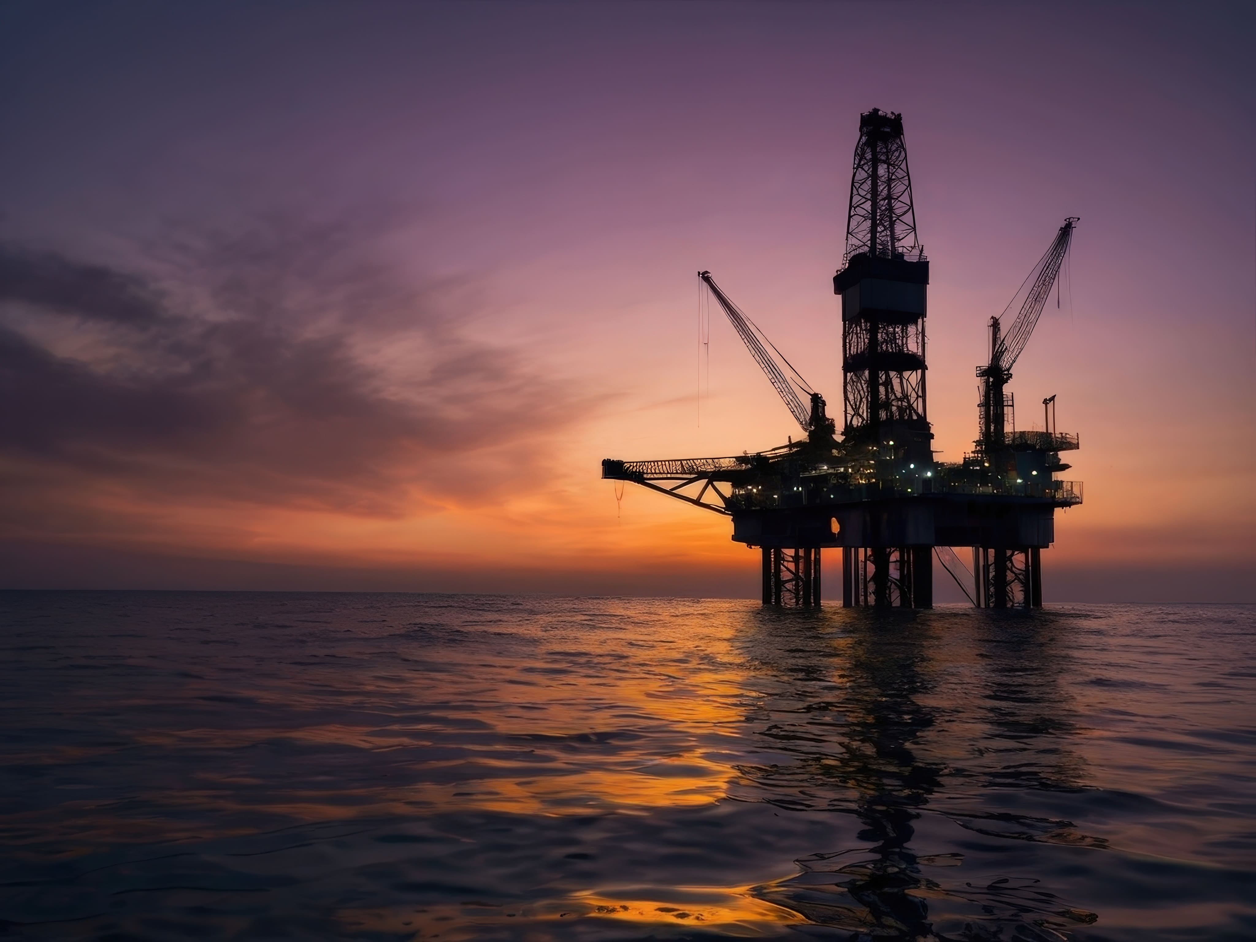 Oil rig at sunset representing Sunbeth Energies' commitment to energy excellence